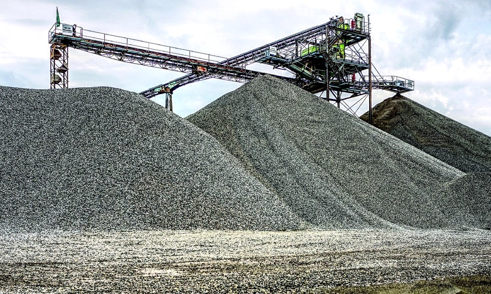 Crushed stone stockpile with conveyor system